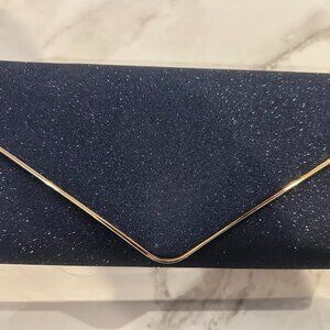 Navy glitter clutch bag